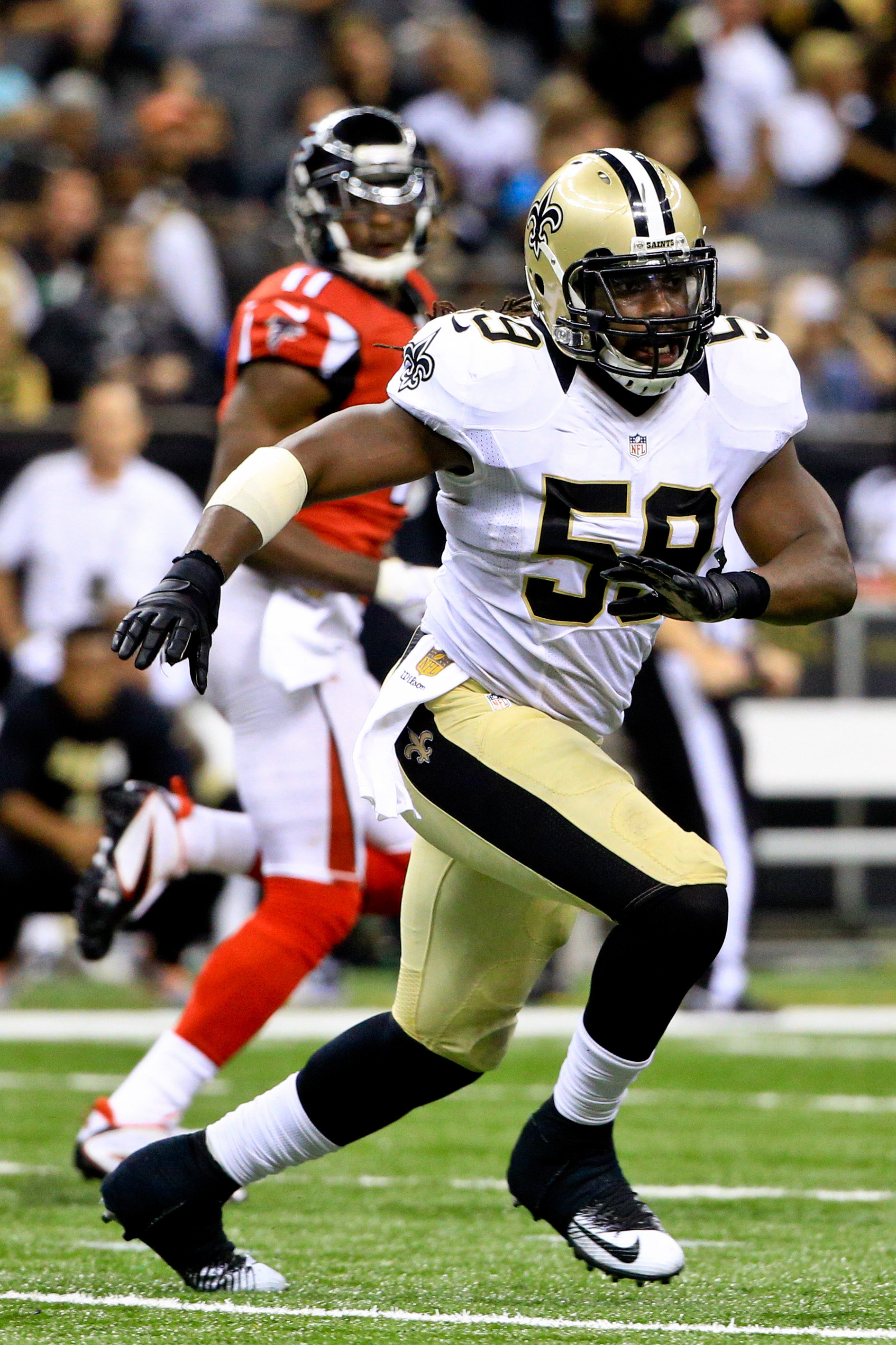 Dannell Ellerbe on the field running